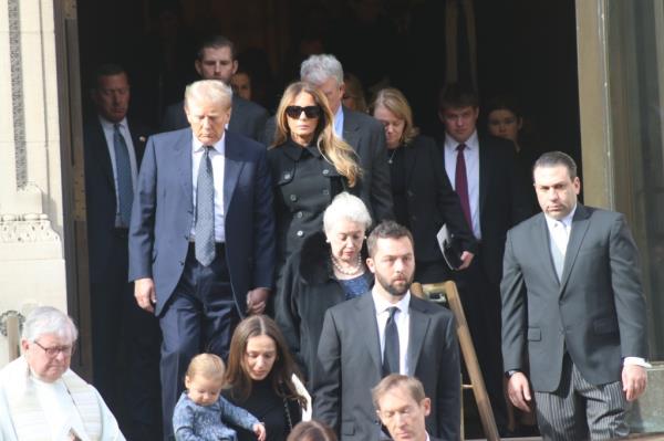 Trump and his wife Melania, and his children Don Jr., Eric, and Ivanka were seen waiting on the sidewalk in front of St. Ignatius of Loyola church.
