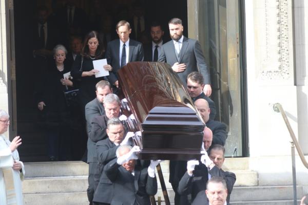 Ushers were pictured carrying out Trump Barry's casket out of the church when the funeral ended.