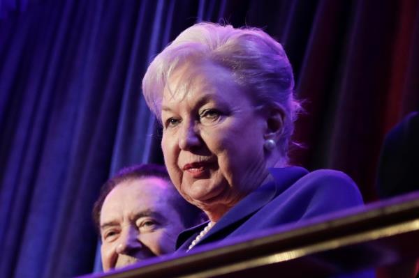 Maryanne Trump Barry, a woman with white hair and wearing a blue blouse and pearls.